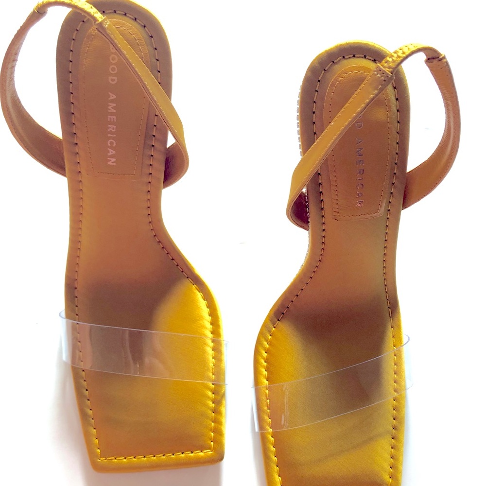 Beautiful sling back stiletto with rhinestone detail. Never worn.